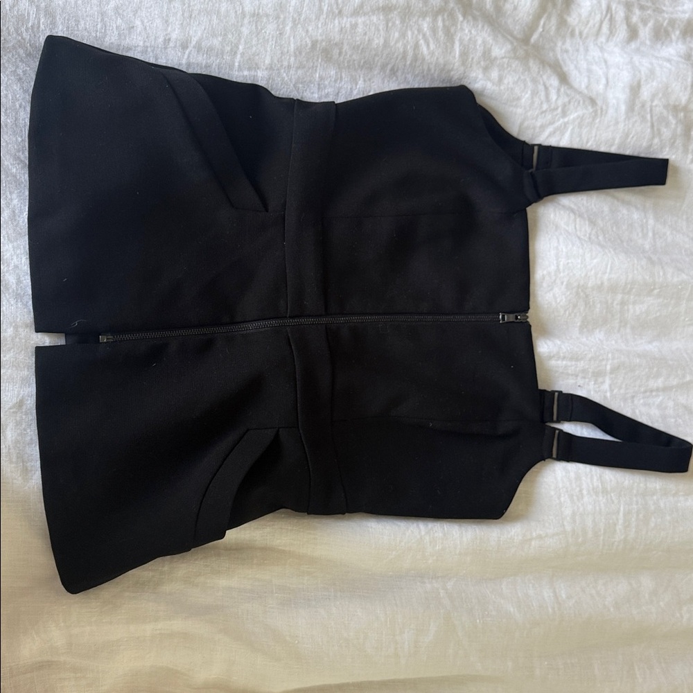 vintage top with silver zip down the middle and open back